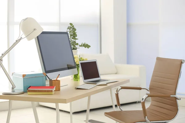 Workplace with computer and laptop — Stock Photo, Image