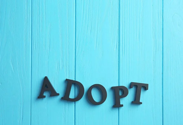 Wort Adoption aus Buchstaben — Stockfoto