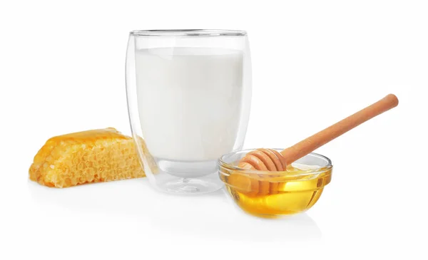 Composizione con latte, miele e favo — Foto Stock