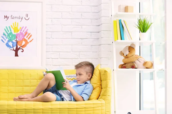 Boy reading book — Stock Photo, Image