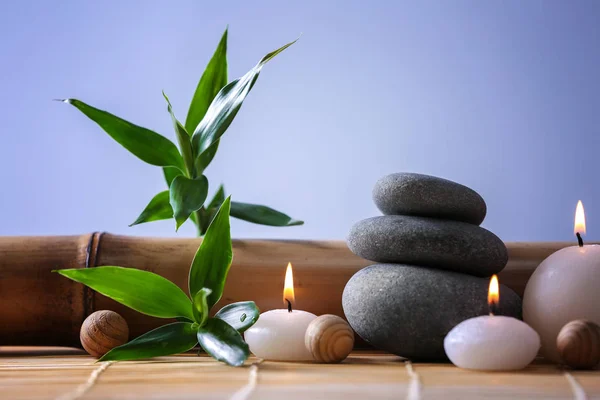 Piedras de spa con velas — Foto de Stock