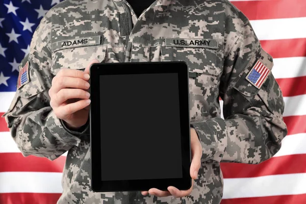 Soldier holding digital tablet — Stock Photo, Image