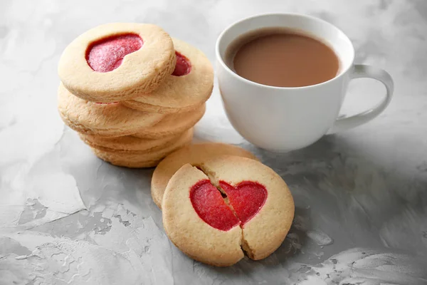 Cookies with coffee on grunge background — Stock Photo, Image
