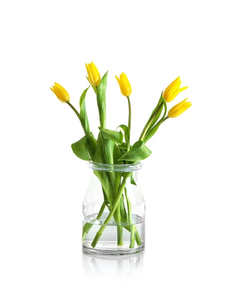 Glass vase with bouquet of tulips — Stock Photo, Image
