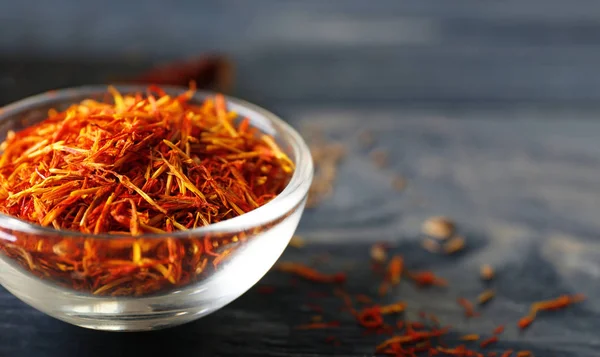 Saffron in glass bowl — Stock Photo, Image