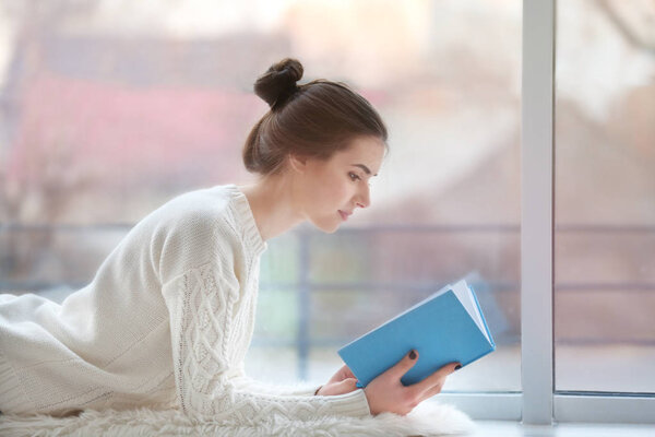 woman reading book