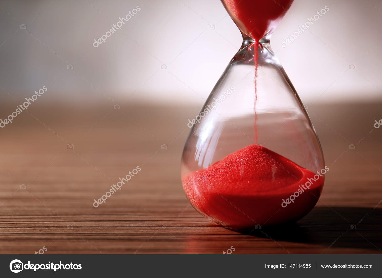 Crystal hourglass with red sand Stock Photo by belchonock 147114985
