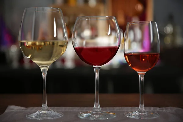 Three glasses with tasty wine — Stock Photo, Image