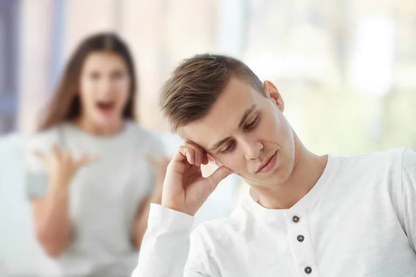 Young man with angry girlfriend — Stock Photo, Image