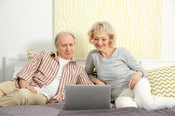 Senior couple making video call