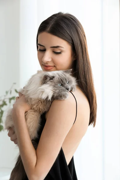 Beautiful woman with cute cat — Stock Photo, Image