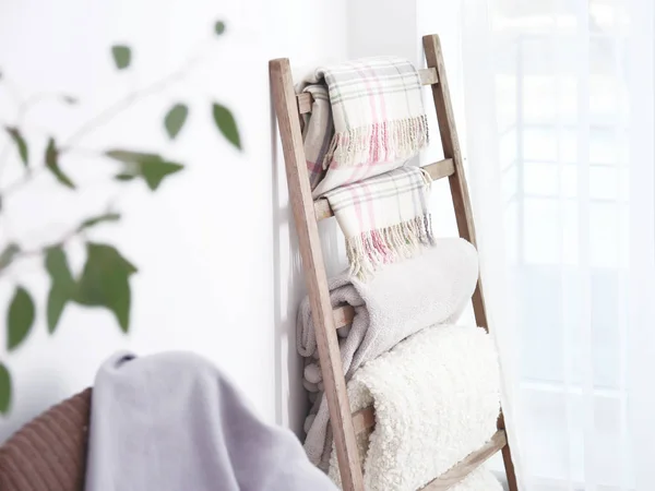 Warm plaids on ladder — Stock Photo, Image