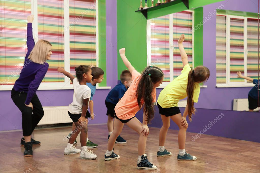 Dance teacher and children in choreography class — Stock Photo