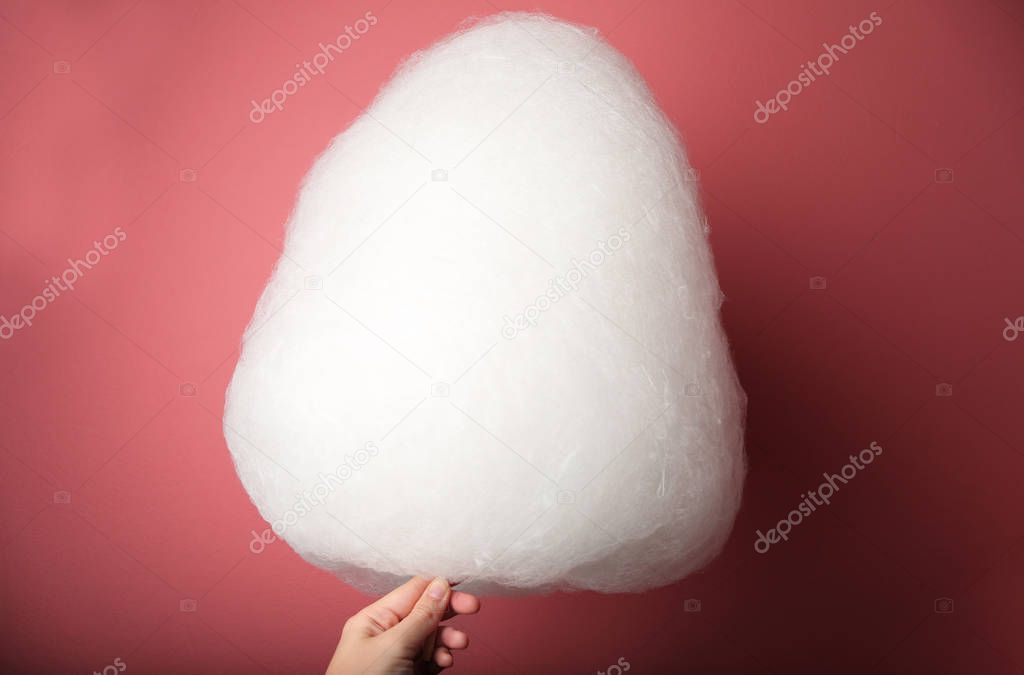 hand holding cotton candy