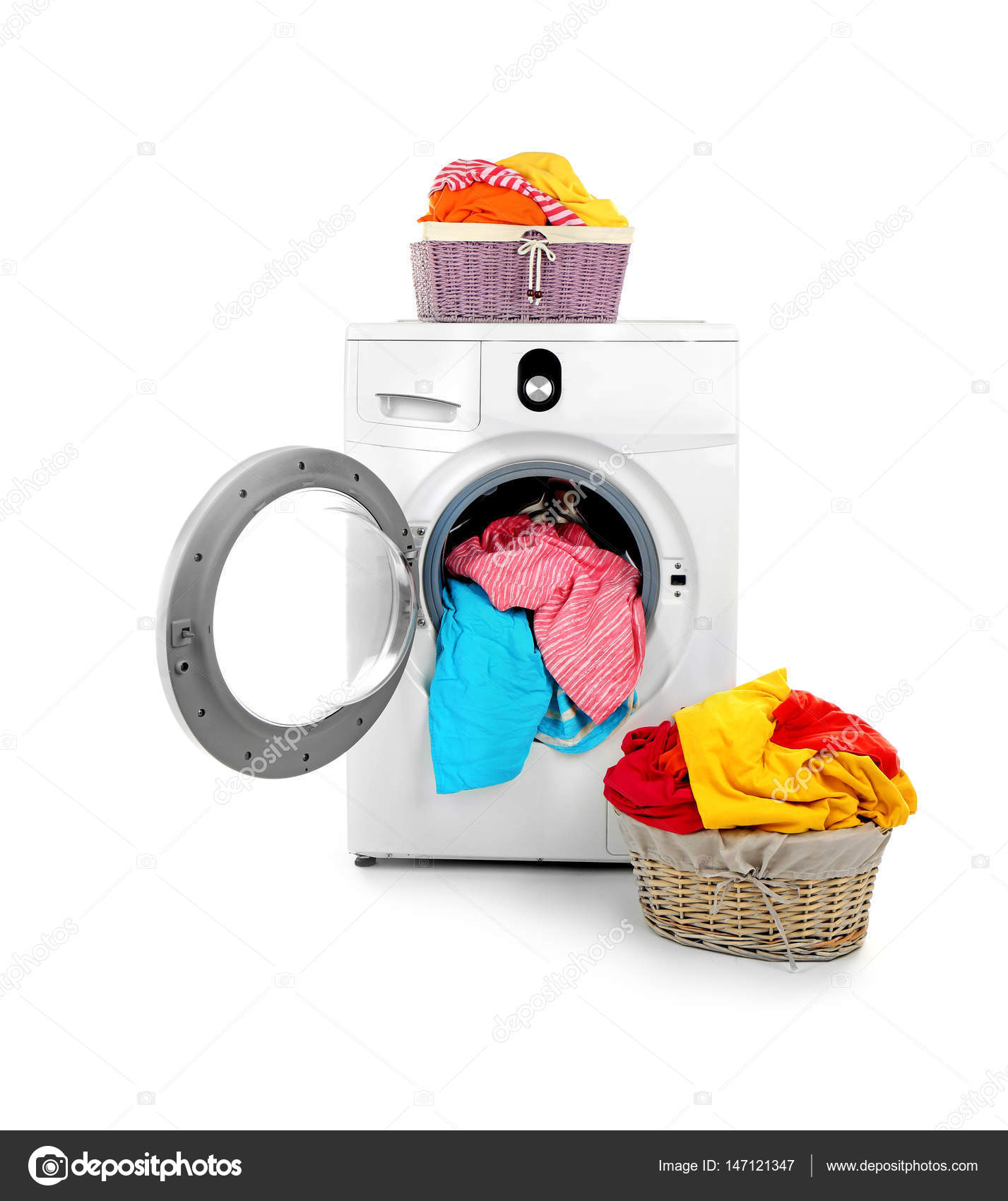 Clothes in washing machine Stock Photo by ©belchonock 147121347