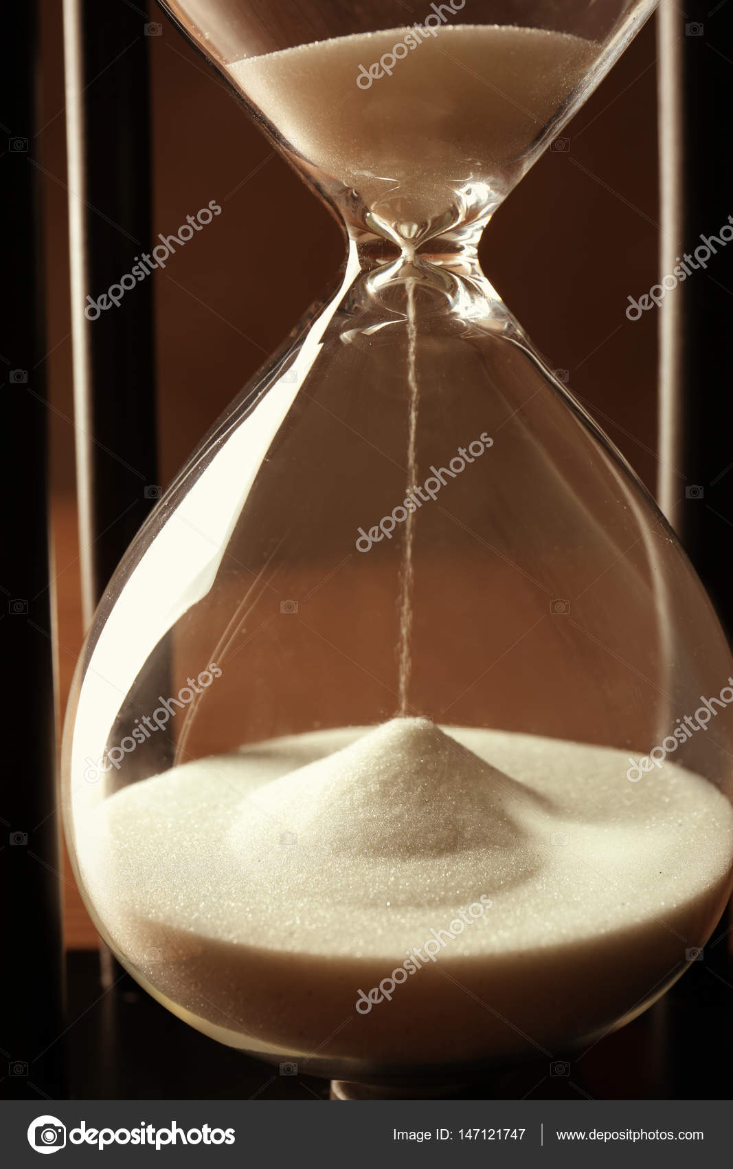 Hourglass with white sand Stock Photo by ©belchonock 147121747