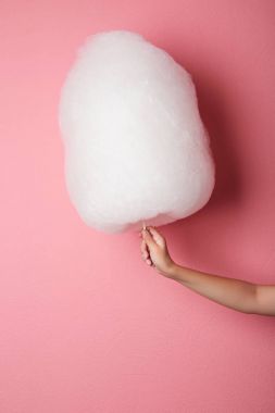 hand holding cotton candy clipart