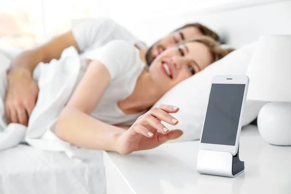 Happy couple waking up — Stock Photo, Image