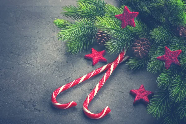 Candy canes and Christmas decorations — Stock Photo, Image