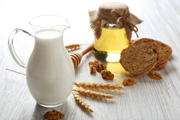 Composition with milk, honey and bread — Stock Photo, Image