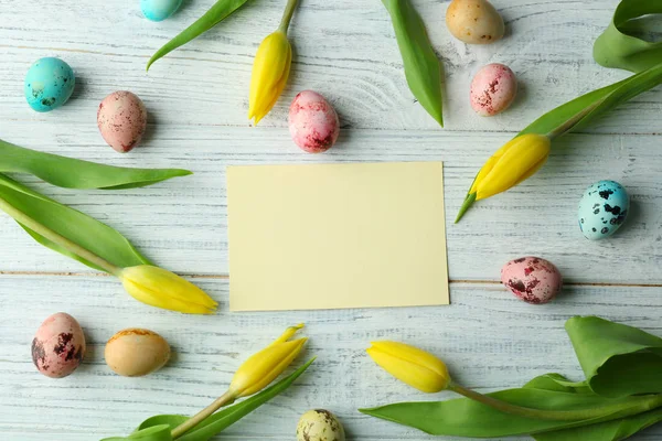 Easter eggs with blank card — Stock Photo, Image