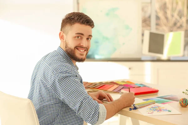 Young creative designer working at office — Stock Photo, Image