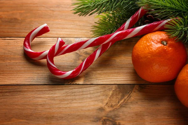 Christmas candies with oranges — Stock Photo, Image