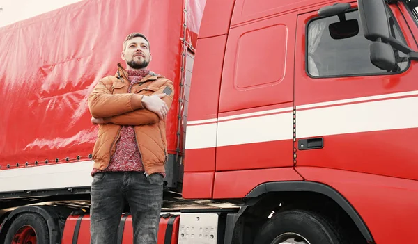 Handsome driver near big modern truck outdoors — Stock Photo, Image