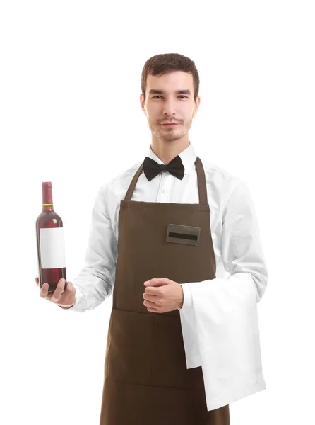 Cute waiter holding bottle of wine — Stock Photo, Image