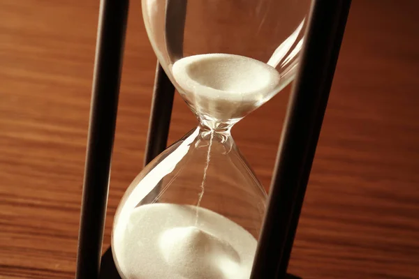 Hourglass with white sand — Stock Photo, Image