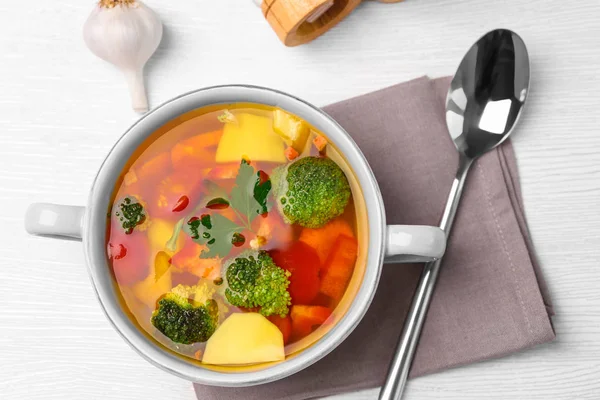 Saucepan with vegetables soup — Stock Photo, Image