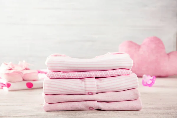 Pile of baby clothes — Stock Photo, Image