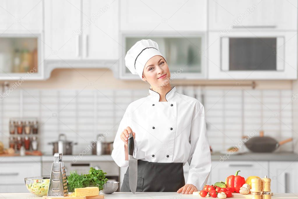 young female chef in kitchen
