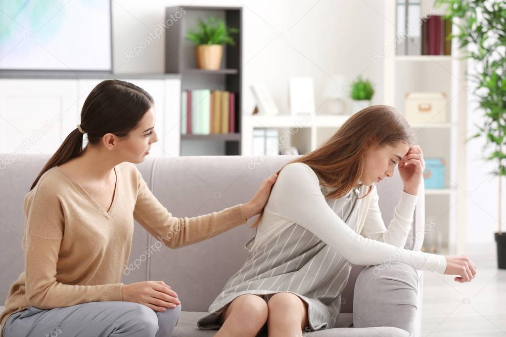 psychologist working with teenager girl