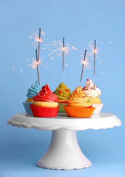 Delicious Cupcakes with sparklers — Stock Photo, Image