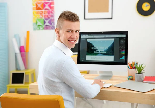 Young designer at workplace — Stock Photo, Image