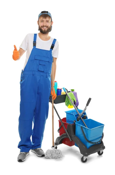 Young man with cleaning supplies — Stock Photo, Image