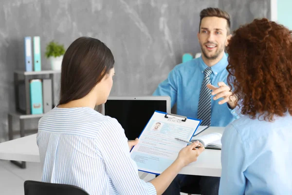 Job interview concept. Human resources commission interviewing man — Stock Photo, Image