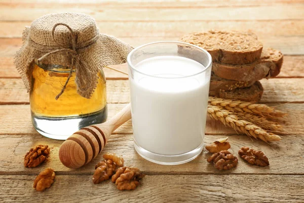 Composition with milk, honey and bread — Stock Photo, Image