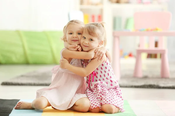 Adorable little girls in beautiful dresses — Stock Photo, Image