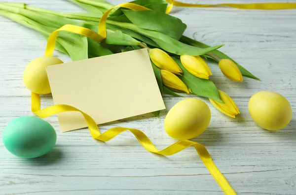 Easter eggs with blank card — Stock Photo, Image