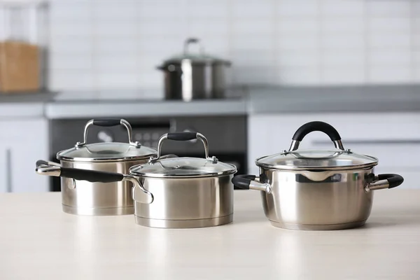 Metal pans in kitchen — Stock Photo, Image