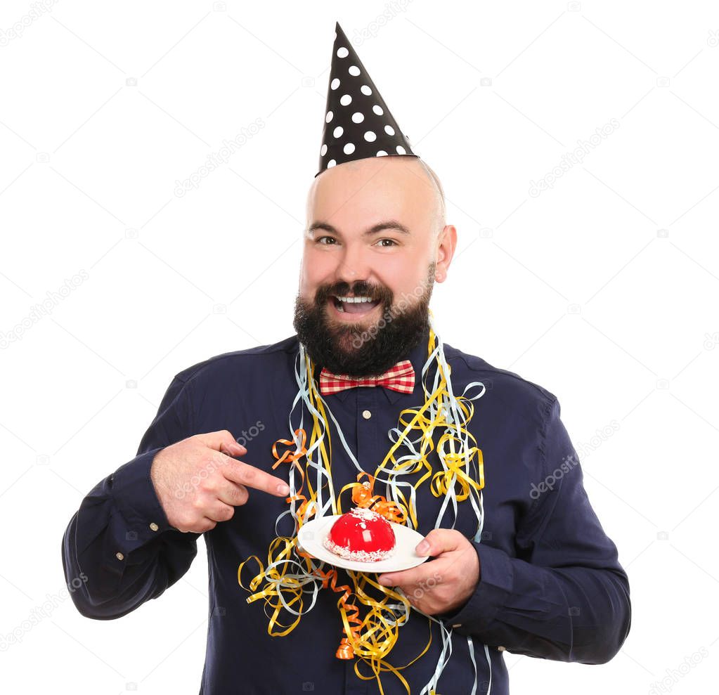 man with cake and party hat 