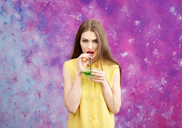 Young woman with cocktail — Stock Photo, Image