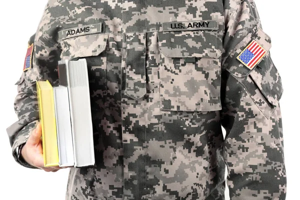Asker holding kitaplar — Stok fotoğraf