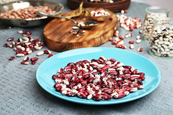 Plate with dried haricot beans — Stock Photo, Image