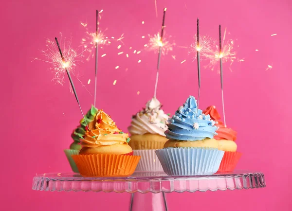 Delicious Cupcakes with sparklers — Stock Photo, Image