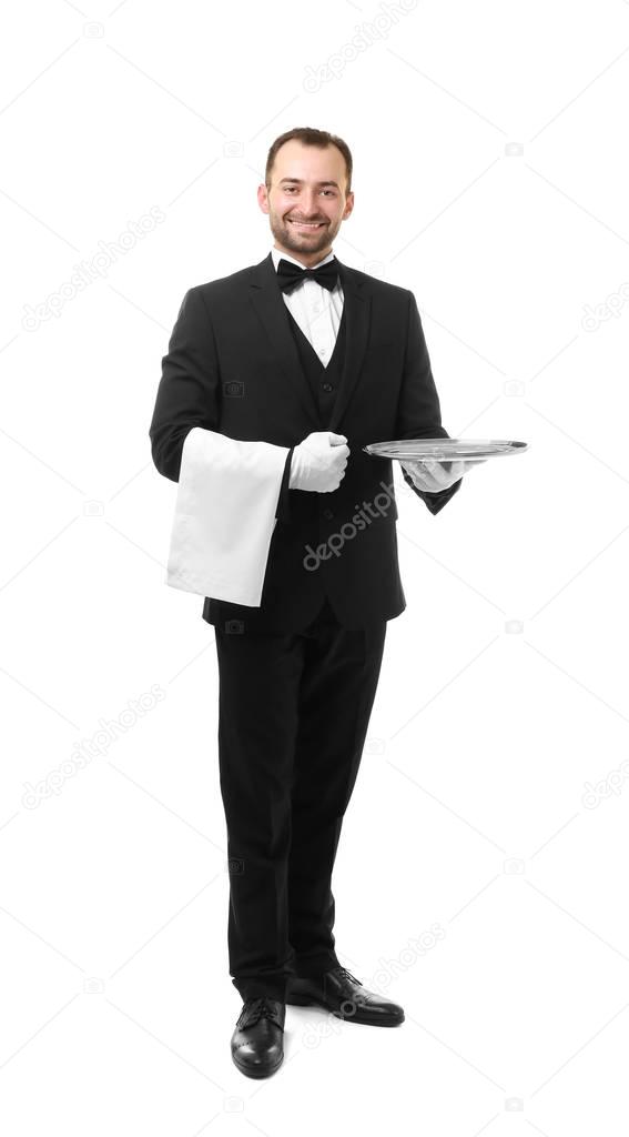 Handsome waiter with metal tray  