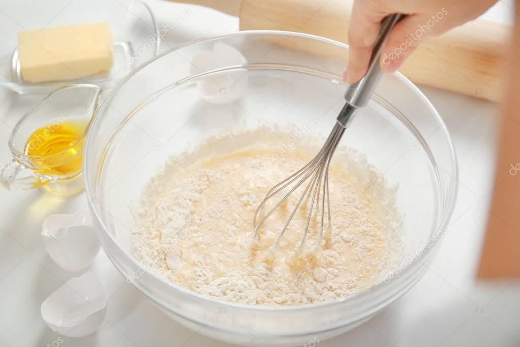 Woman making dough