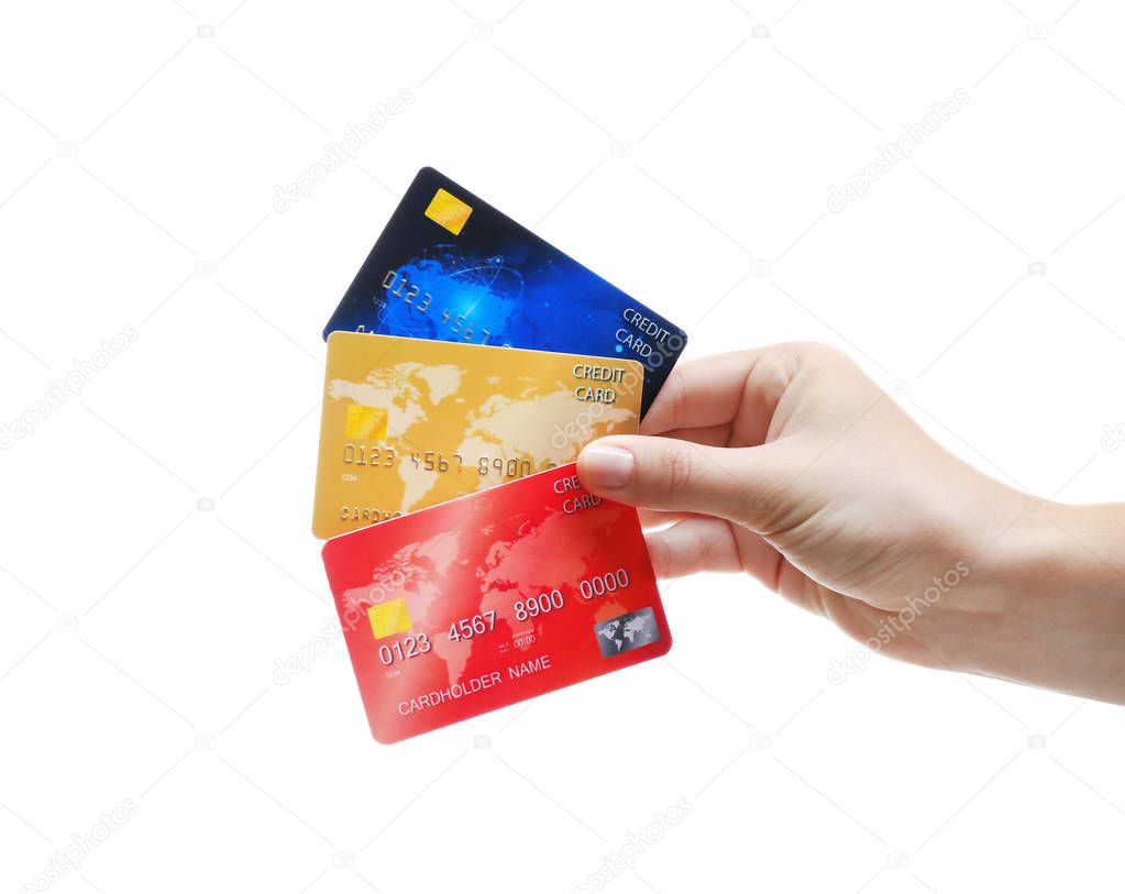 Hand holding credit cards